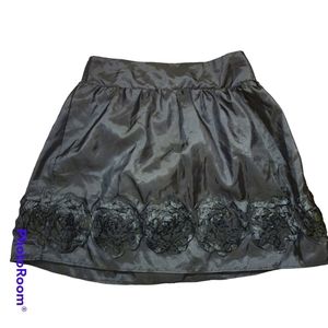 BCX large black skirt with flower embellishments at bottom. 100% polyester